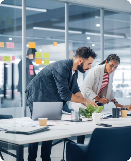 Asire Solutions team planning at a desk